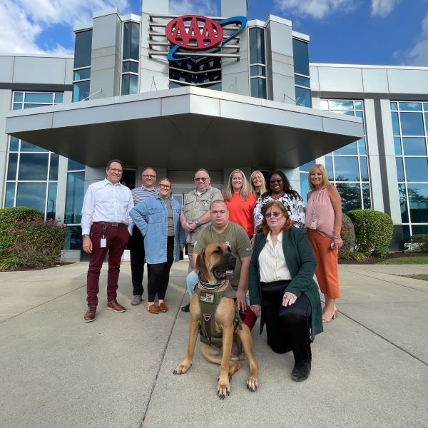 Vanessa the service dog provides a tail-wagging visit