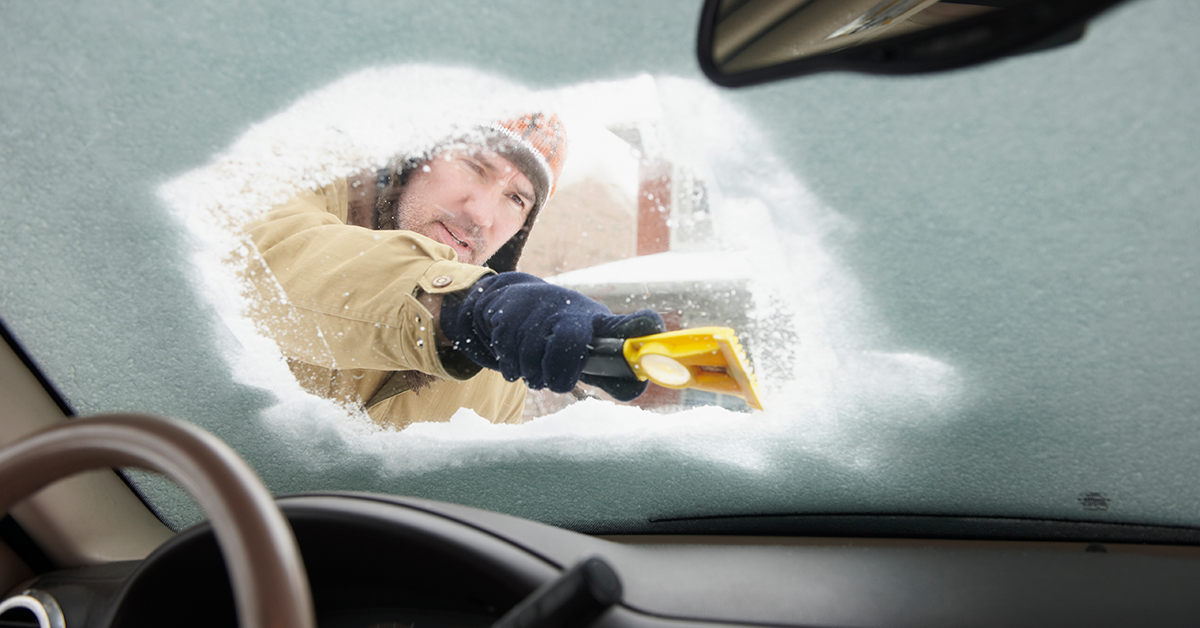 Cleaning snow off of windshield