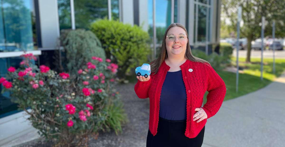 Picture of Rachel Brogan with car she crocheted