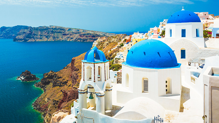 Blue domed buildings in Santorini Greece