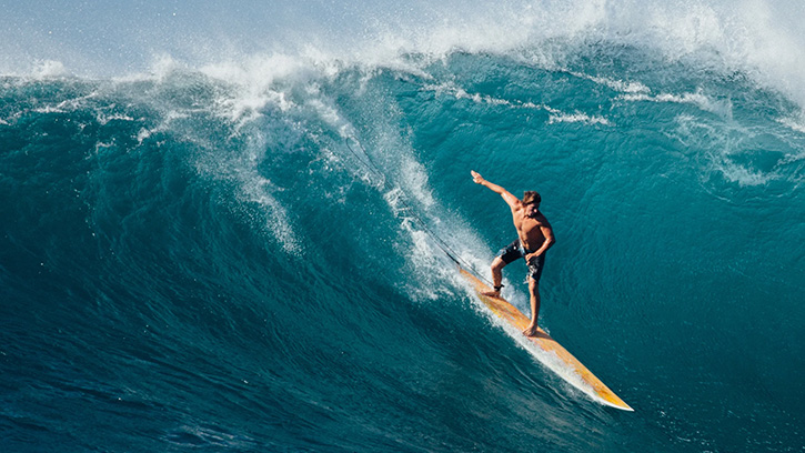 Person surfing on a big wave