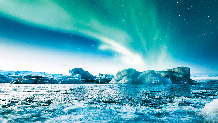 Aurora borealis over Icelandic landscape