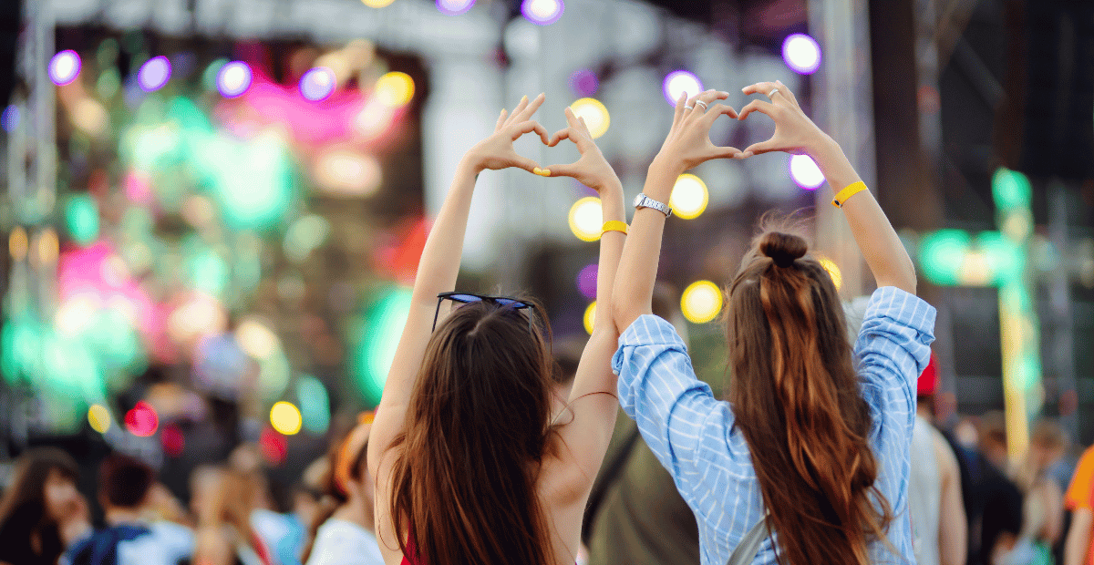 Two women at an outdoor concert