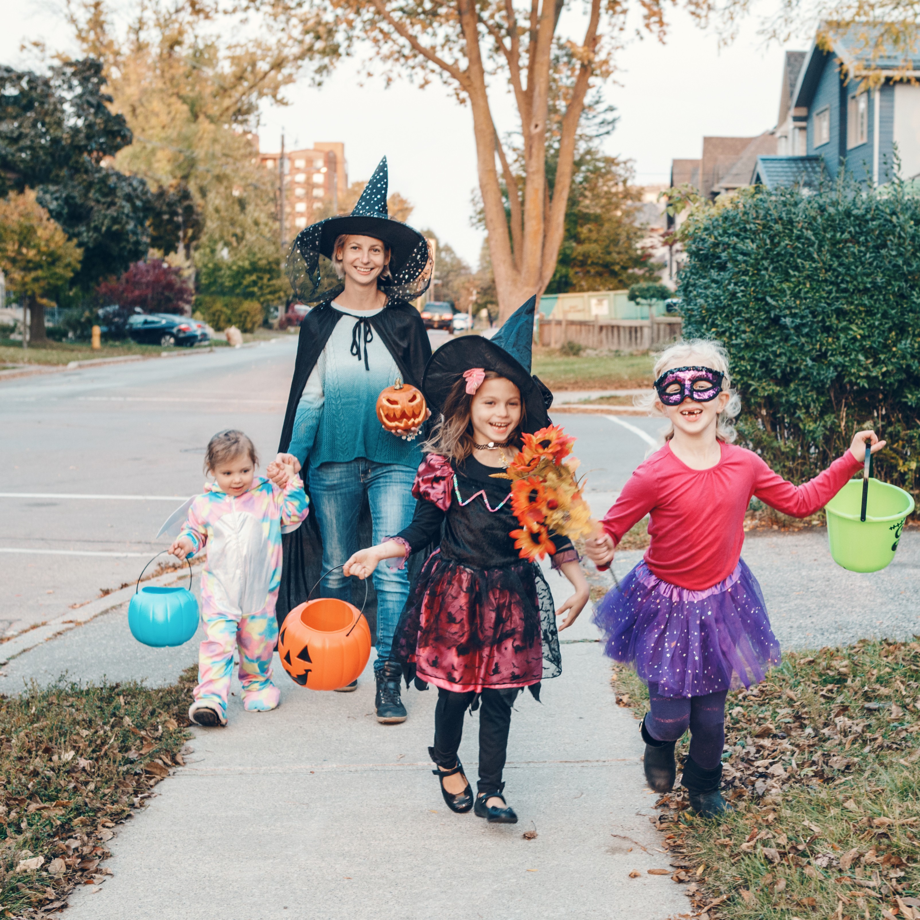 kids in halloween costumes ready for trick or treating