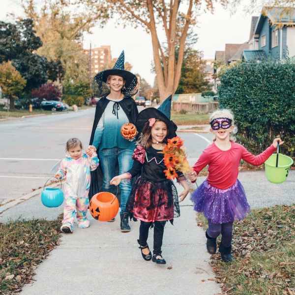 kids in halloween costumes ready for trick or treating